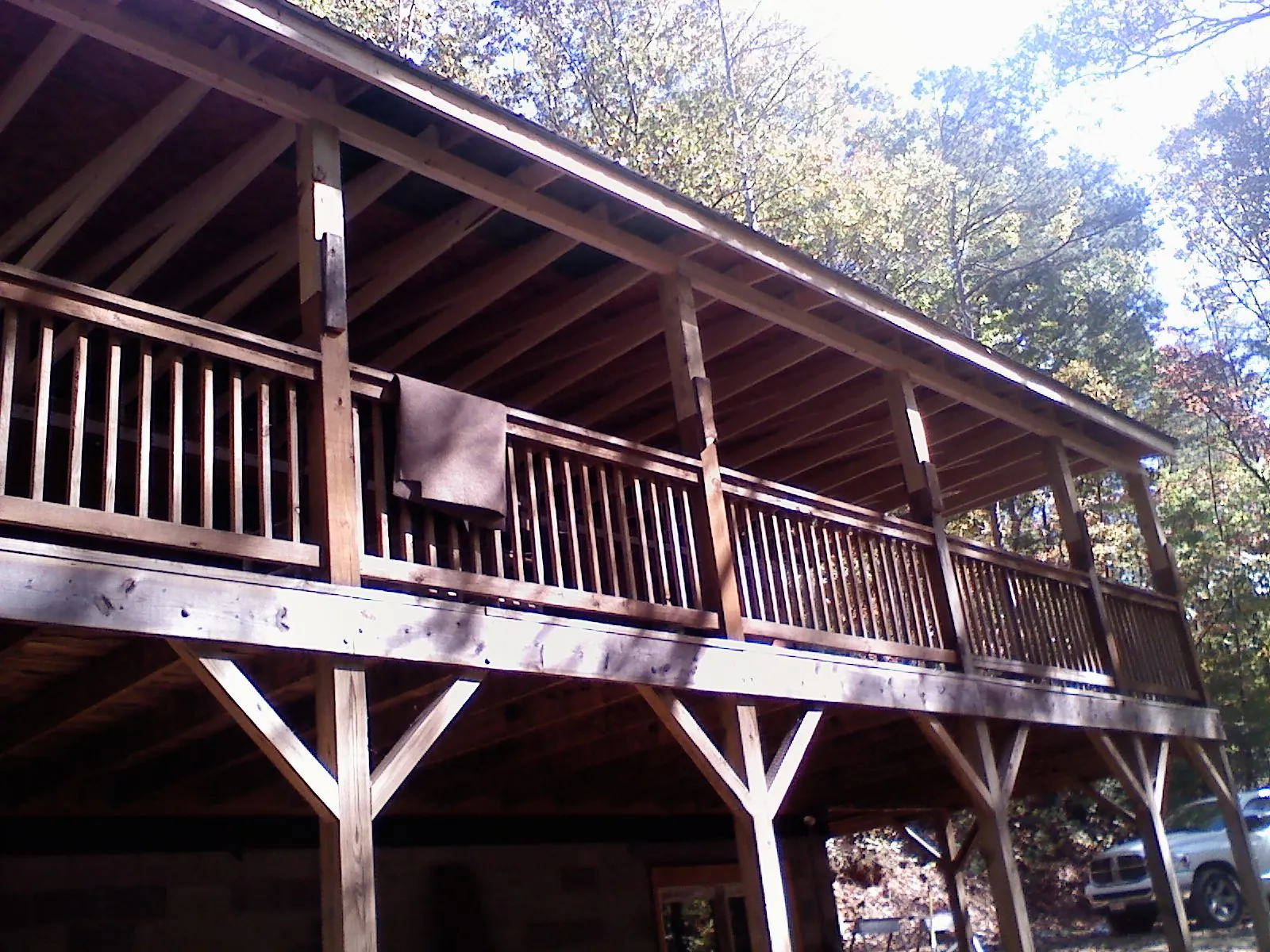 Timber framing under a new elevated porch and deck — Roof Leak Repair in Ortonville by Roofing Brothers